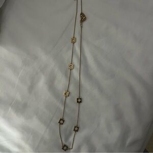 EUC Kate Spade long necklaces with cut out logo, gold studs